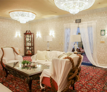 Bristol Hotel event space - couches and chairs at a table in a hotel