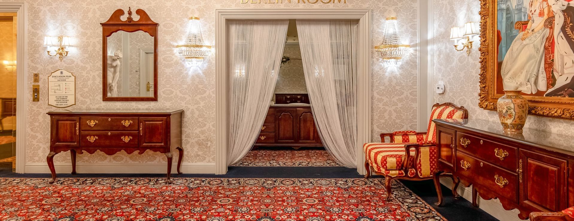 wooden furniture and a chair in a hotel